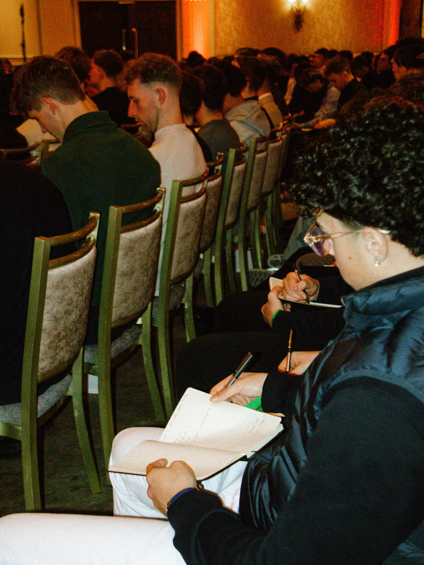 An Affinity training session in a packed seminar room