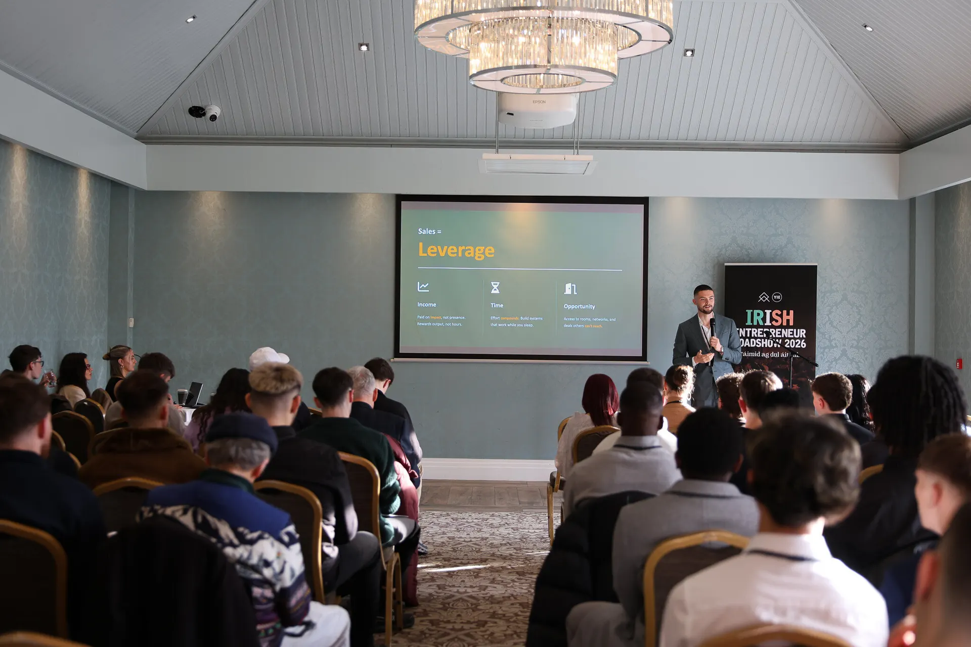 An Affinity speaker on stage at a live event